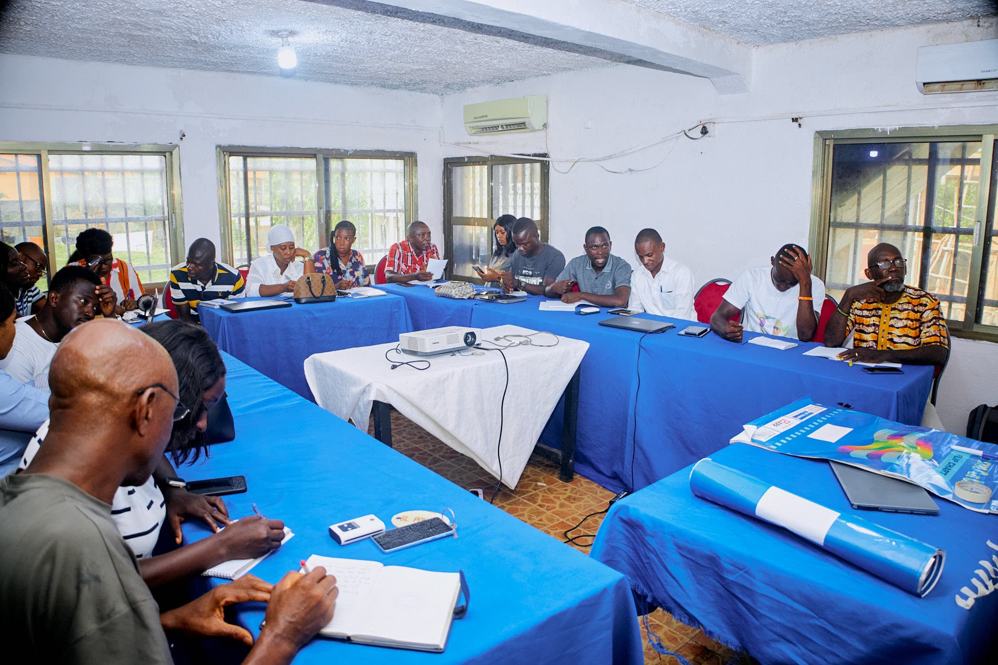 Entrepreneurs collaborating during a training workshop
